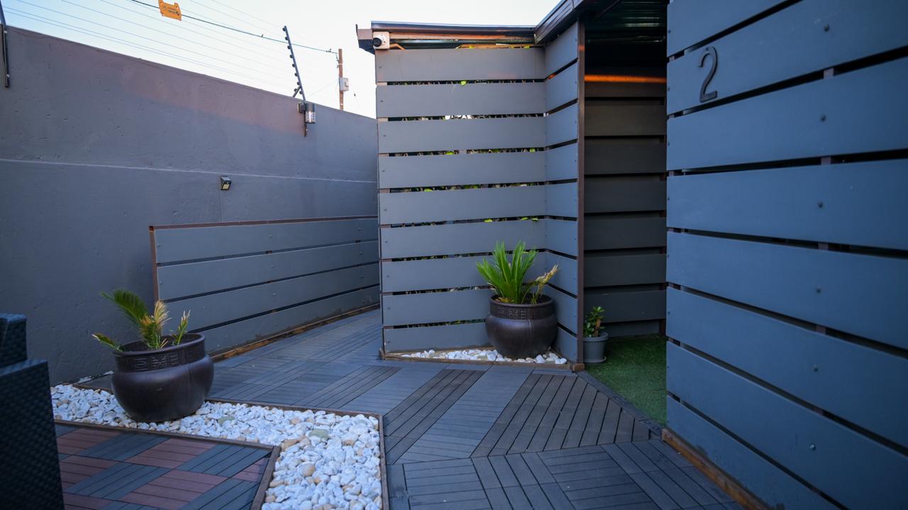The Bright Room — private courtyard entrance and walkway