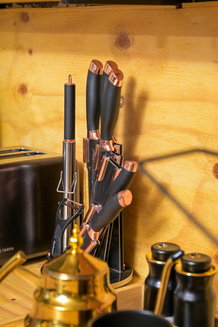 The Dark Room — knife set and coffee corner in the kitchenette