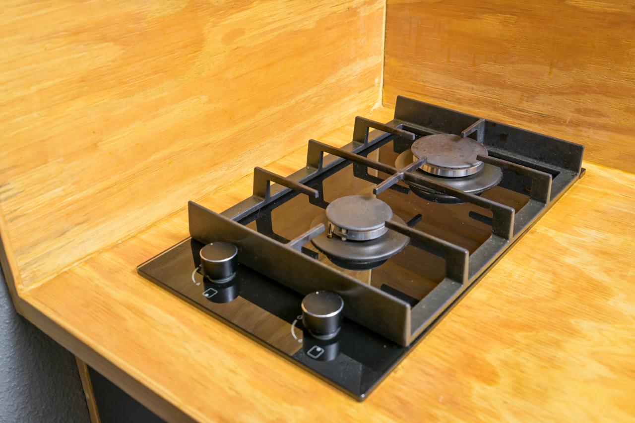 The Dark Room — two-plate gas hob in the kitchenette
