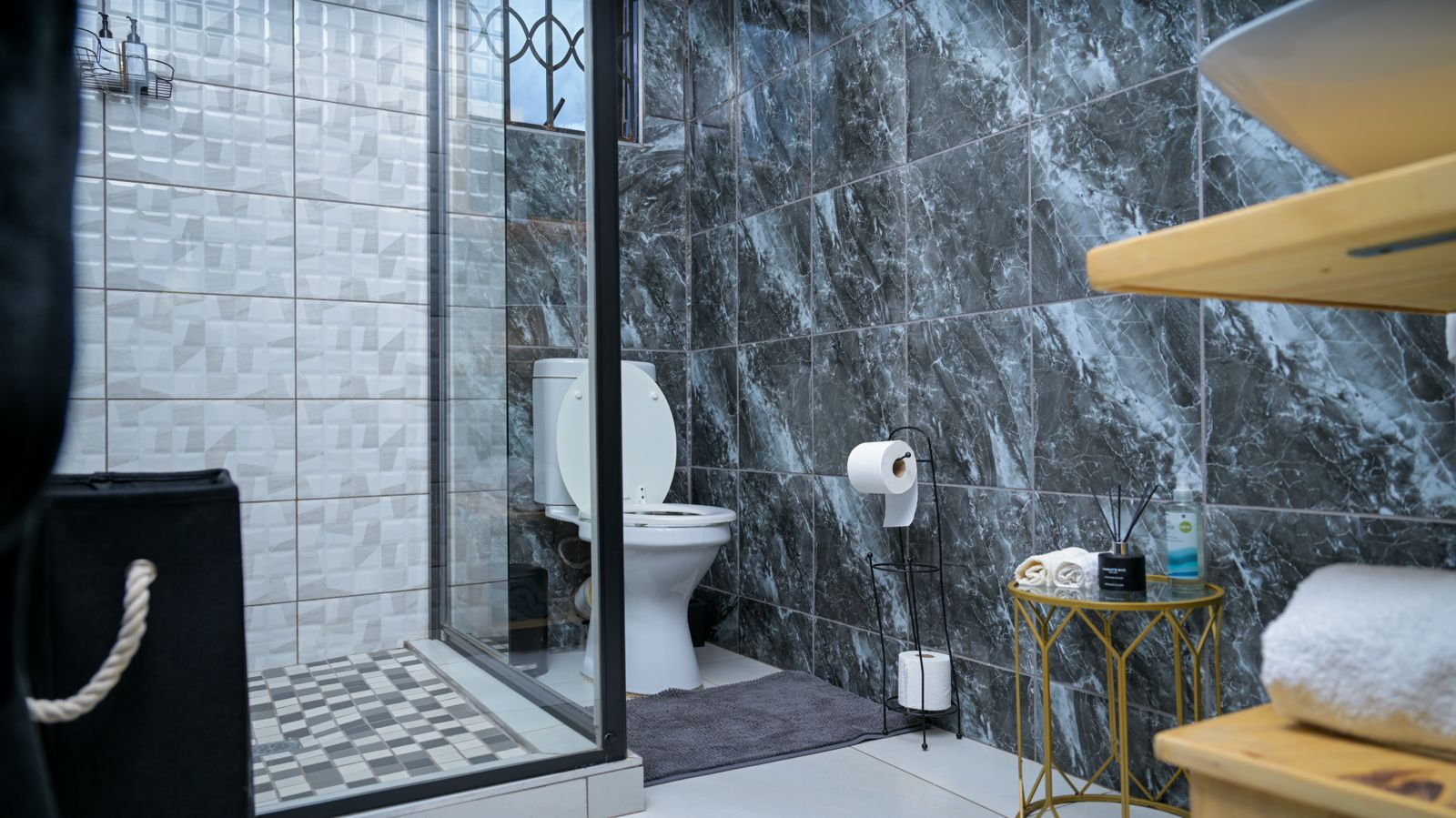 The Dark Room — spacious en-suite bathroom and glass shower