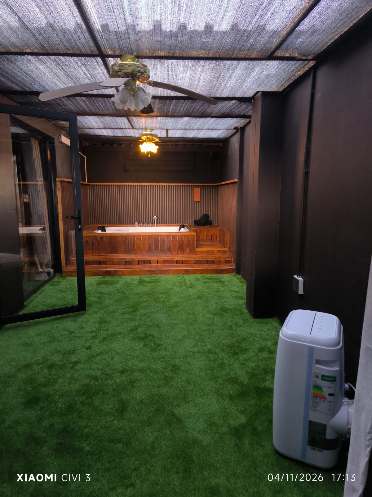 The Mihla Room — private patio with wood-clad hot tub