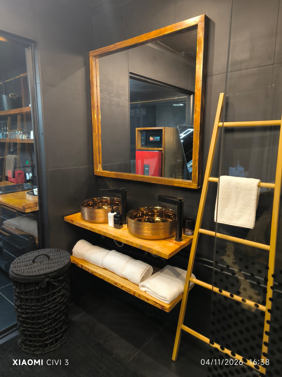 The Mihla Room — bathroom with double bronze basins
