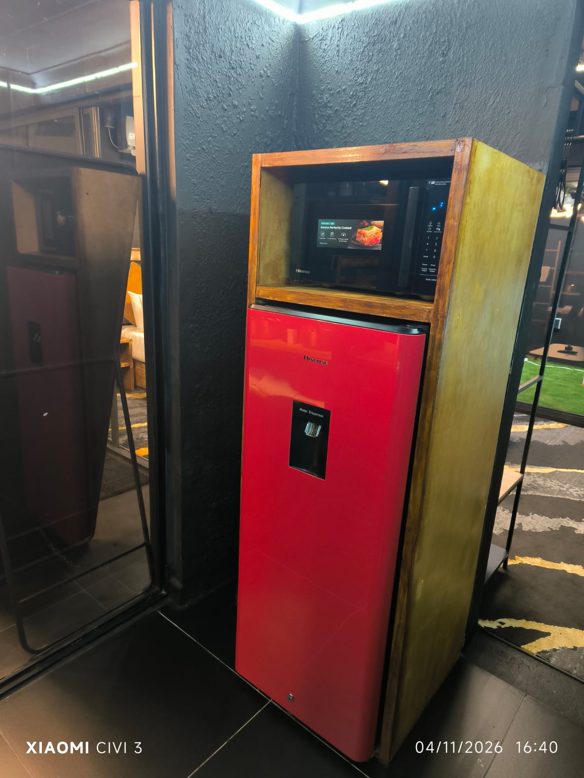 The Mihla Room — microwave and red fridge