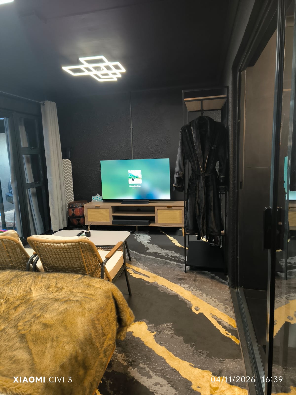 The Mihla Room — television, lounge seating and wardrobe